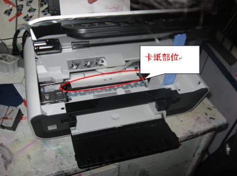 我们公司的联想打印机S2002那个倒三角形按钮