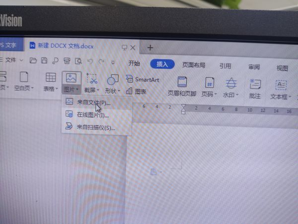 word 如何将两张相片打印到一张A4纸上？